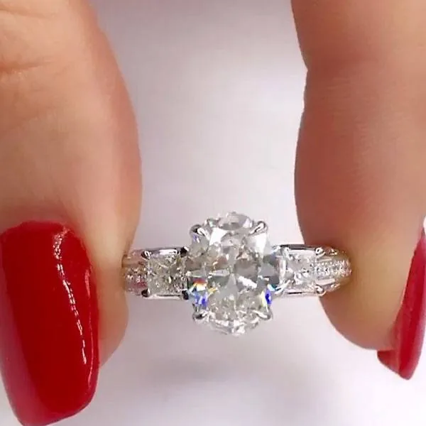 Handmade 3 CT Oval Cut Engagement Ring with Two Princess Sidestones