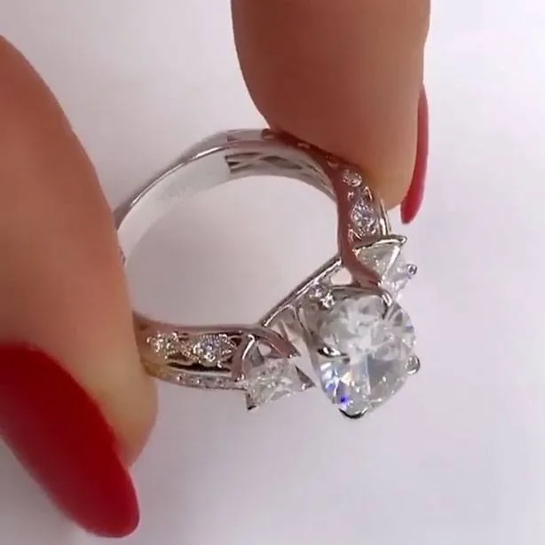 Handmade 3 CT Oval Cut Engagement Ring with Two Princess Sidestones