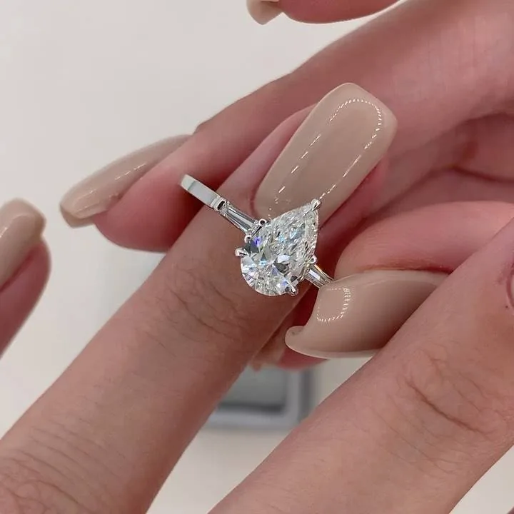 3ct Pear Cut Ring with 2 Tapered Baguette Side Stones