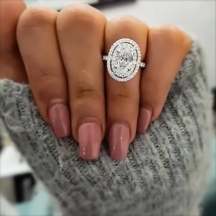 Handmade Oval Cut Halo Sterling Silver Ring