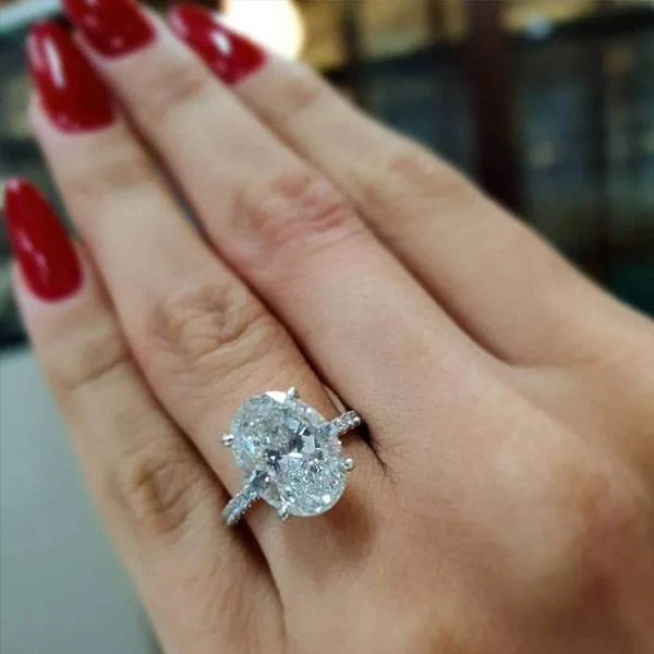 Handmade 4ct Oval Cut Lab Created Sapphire Engagement Ring